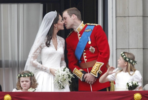 Prince William kisses his bride for the audience
